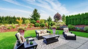 Easy backyard landscaping ideas on a budget with garden beds and mulch